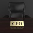 CEO's chair and desk, plus nameplate